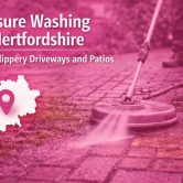 Pressure washing driveway in Hertfordshire removing algae and dirt from block paving